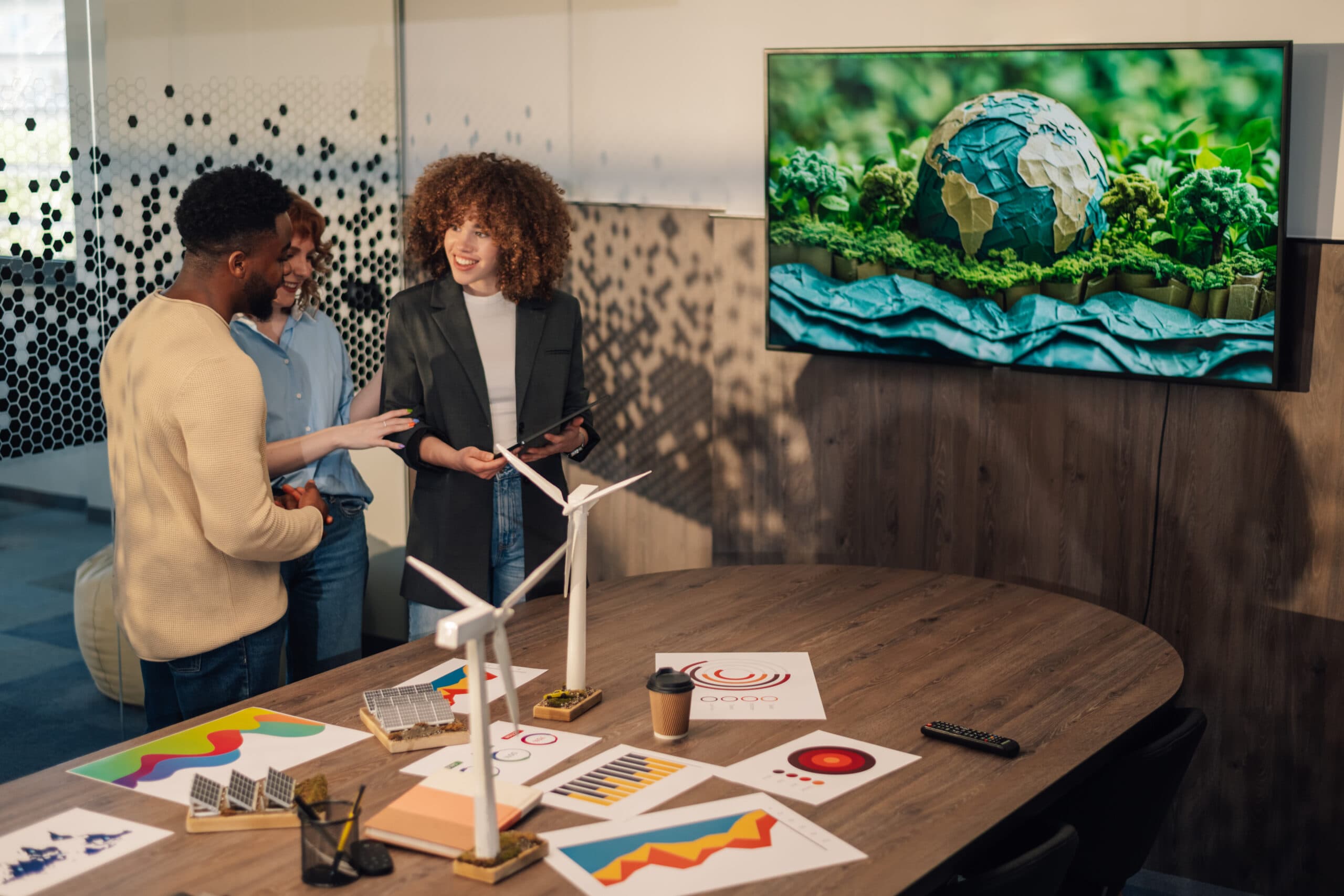 3 people discussing carbon reduction